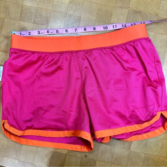 Nike Dri fit pink and orange shorts - Picture 4 of 5